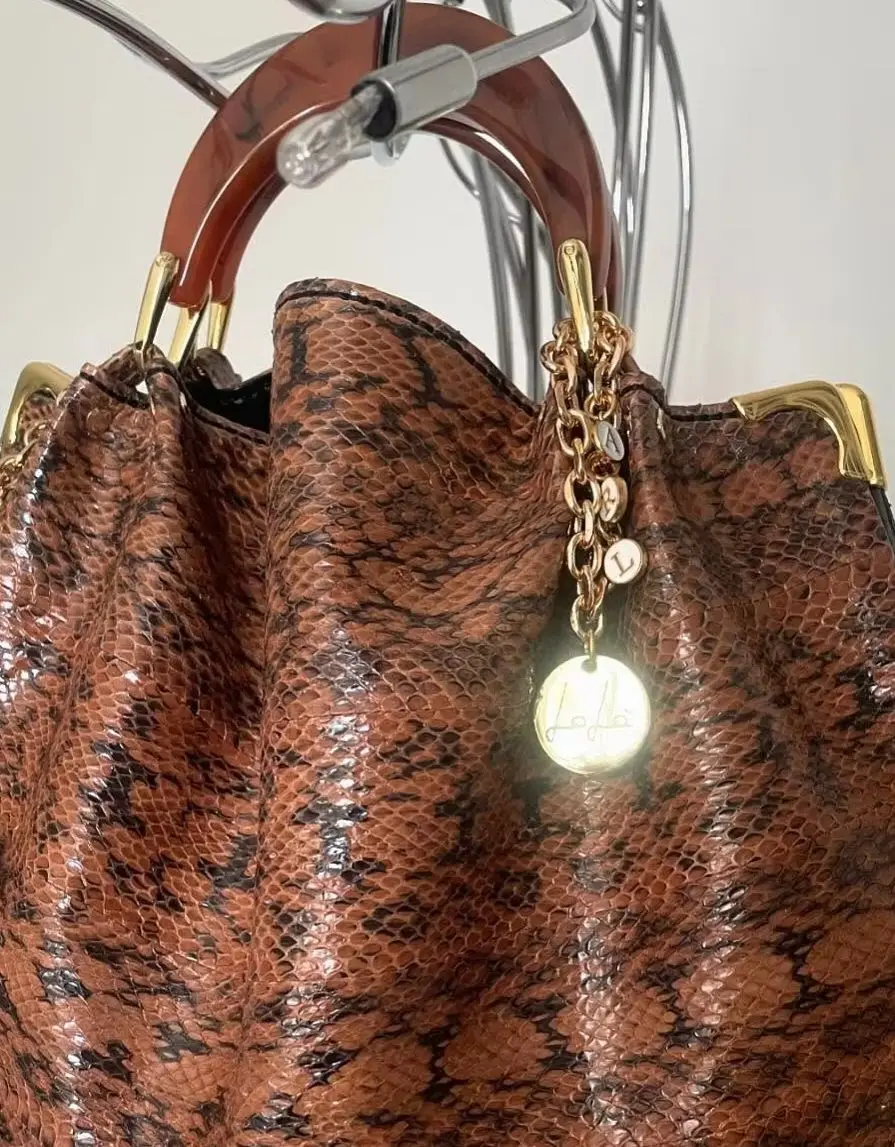 Lost in Vintage Uneven Leather Texture, Wild yellow and Black Snake Pythons Bag with Double Turtle Handles Gold Pendant Bags