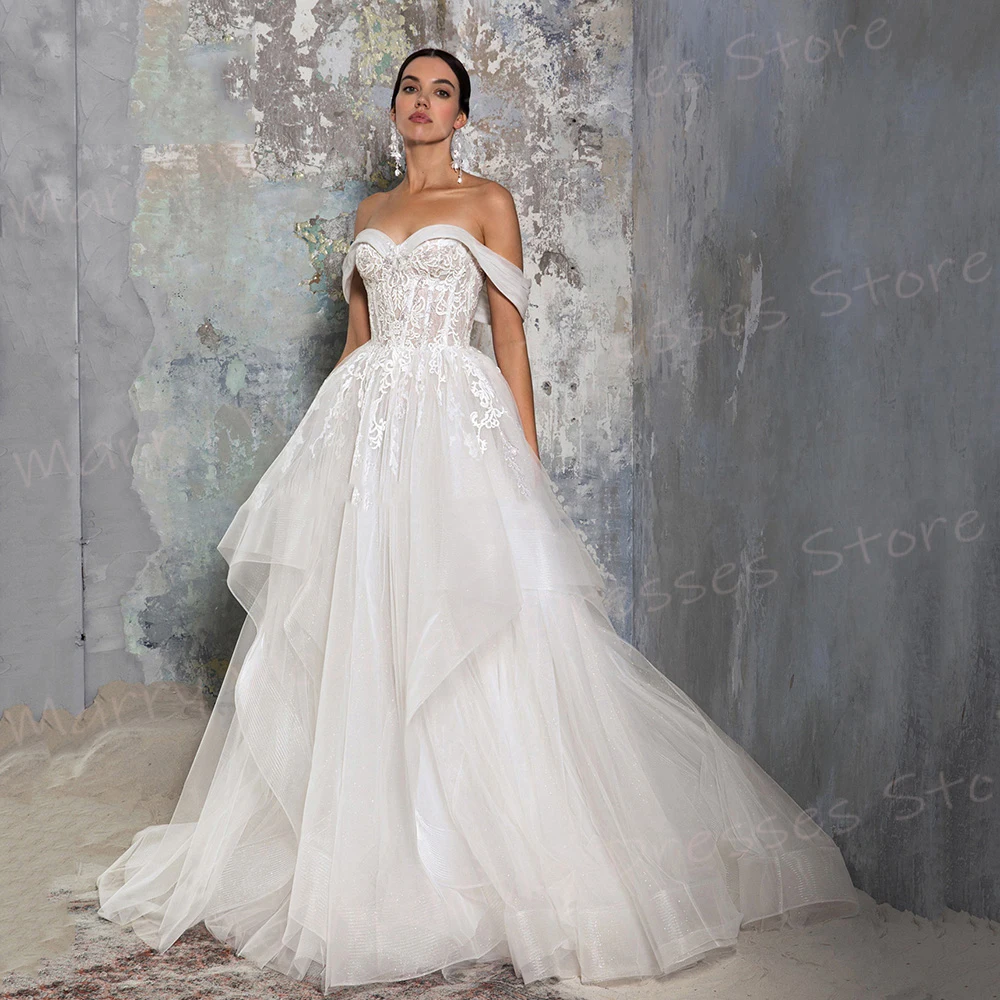 Abiti da sposa romantici da donna A Line eleganti Appliques abiti da sposa in pizzo affascinanti abiti senza schienale con spalle scoperte