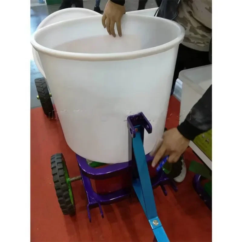 Small Agricultural Fertilizer Spreader for Grass Seed Essential Tool for Farming and Gardening