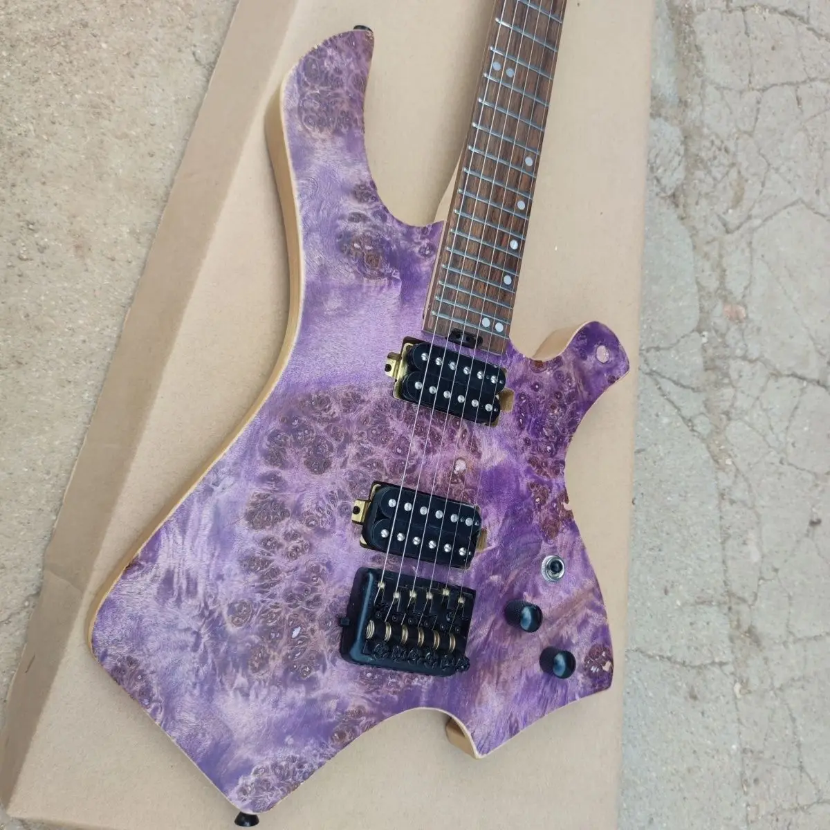 

NEW-Special shape electric guitar, ash xylophone body, stainless steel wire. Burl veneer, body ash