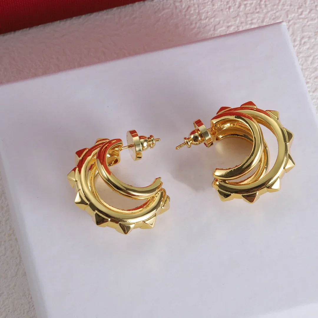2026 Europe America Metal Rivet Curved Gold Earring Woman Fashion Jewelry Trend