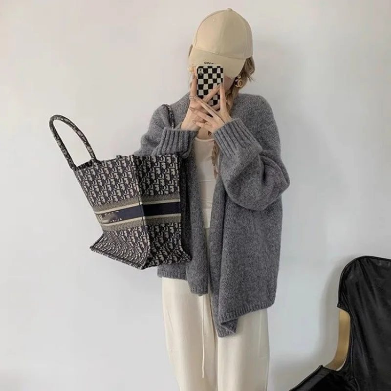 سترة محبوكة بنمط كاجوال متعددة الاستخدامات النسخة الكورية سترة صوفية لطيفة متوسطة الطول للنساء