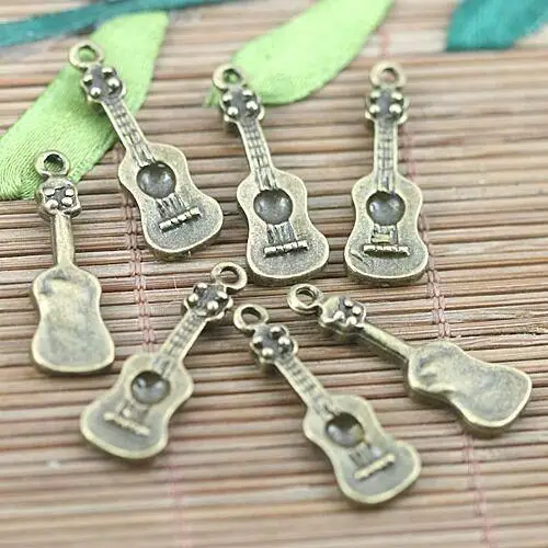 

20pcs 27.6x8.9mm,loop:1.6mm antiqued bronze color music instrument design charms H1578