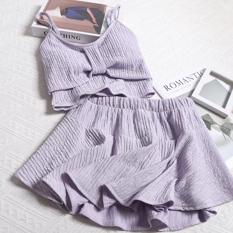 

Woman Elastic Waist Ruffle Edge Short Skirt With Padded Short Camisole Vest Fashionable Age Reducing Sweet Hottie Two-Piece Set