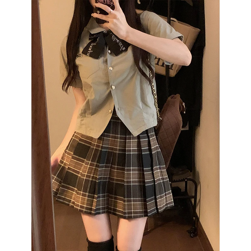 

Новый летний комплект из двух предметов для женщин больших размеров: рубашка и плиссированная юбка в клетку, в корейском стиле, с пуговицами, для офиса и повседневной носки.