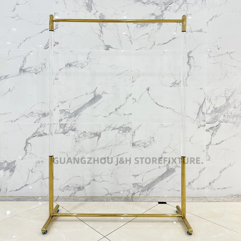 Customized. high end golden floor stand display single bar clothes hanger stand stainless steel acrylic clothing rack retail