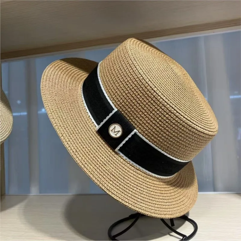 The top hat is a casual flat-topped for women by seaside in summer It shows off face and provides small shade