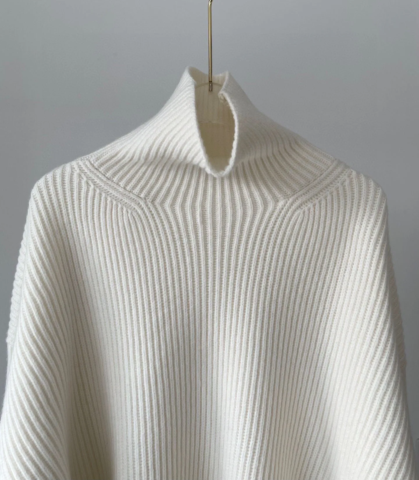 New cashmere wool blend stand up collar, drop shoulder solid color long sleeved knitted sweater sweater