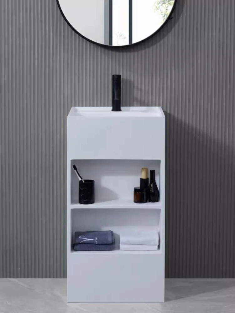 

Интегрированная раковина из искусственного камня в виде колонны, современная, простая, белого цвета.