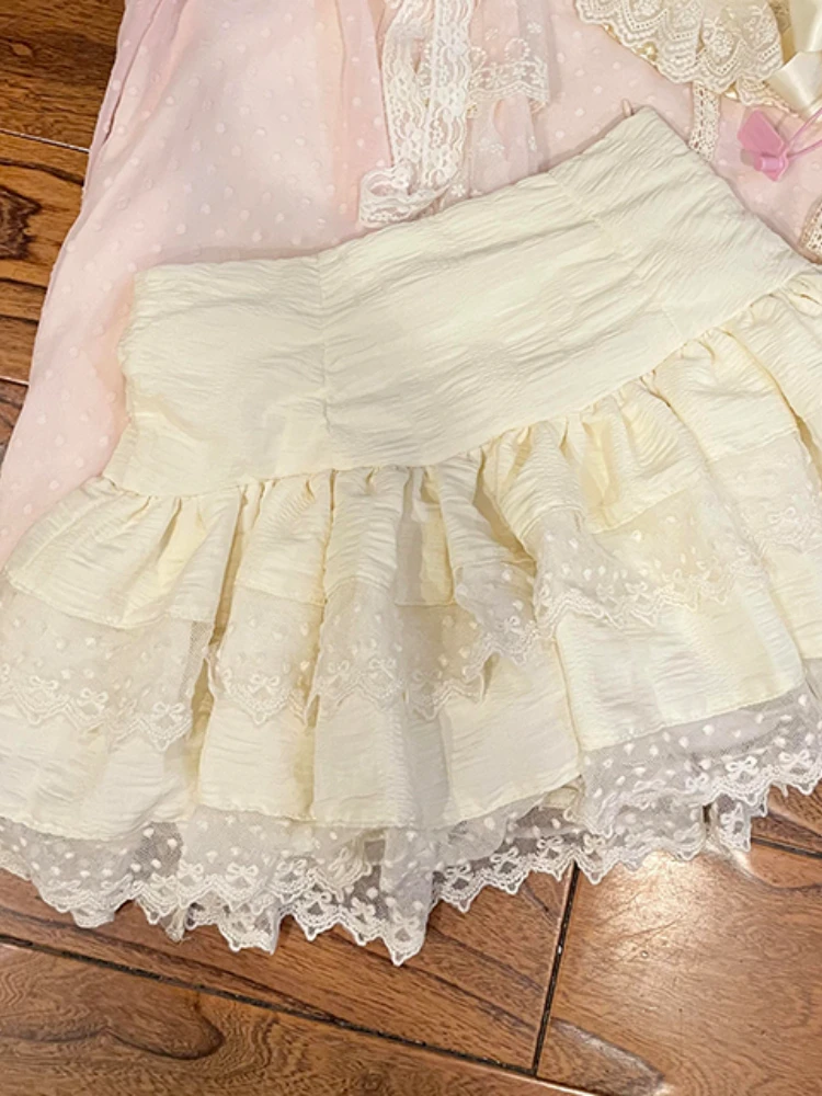2025 الصيف الوردي الحلو الدانتيل المرقعة مجموعة المرأة تحلق كم أعلى + تنورة عالية الخصر دعوى الأميرة الجنية قطعتين مجموعة 2025