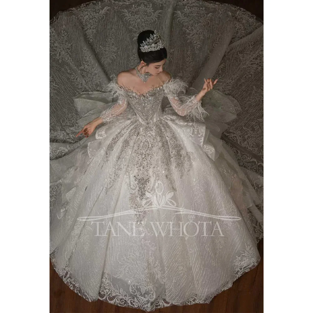 

Роскошное свадебное платье в форме сердца с рукавами три четверти, расшитое бисером и блестками, хрустальными перьями по индивидуальному заказу