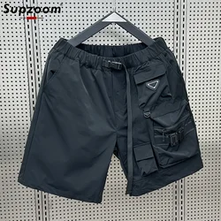 Supzoom-pantalones cortos para hombre, Shorts informales, holgados, con bolsillo de costura de rejilla, diseño de cinturón, a la moda, novedad de verano