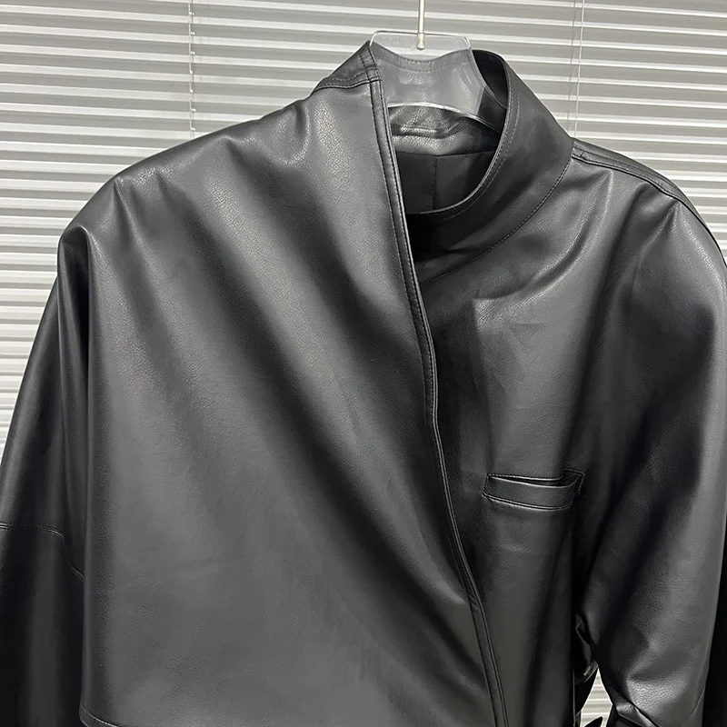 KBQ Solid Spliced Belts Tunic Loose Coats for Women Stand Collar Long Sleeve Korean Version of Casual Leather Jacket Female New