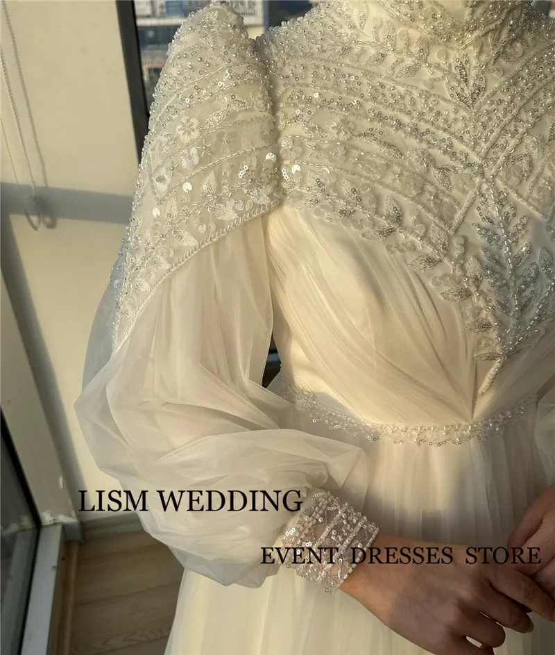 LISM Modest Muslim Arabic Women Wedding Dresses Puff Long Sleeves Glitter High Neck Tulle Bridal Gowns Sweep Train Plus Size