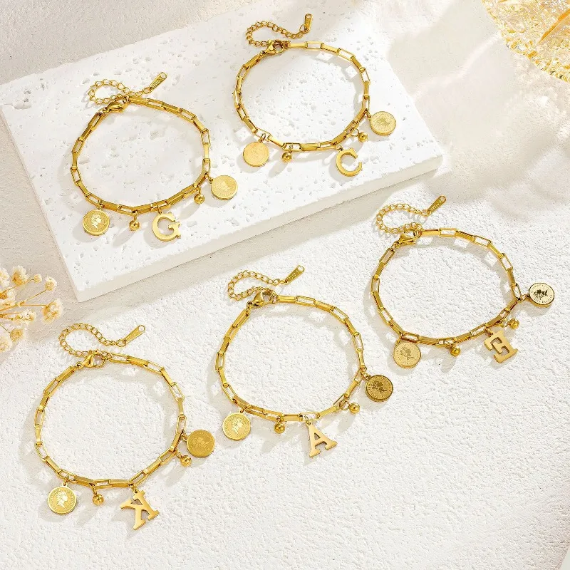 

Queen Coin Letter Stainless Steel Bracelet for Women Small Bell Pendant Adjustable Bracelet Classic Jewelry