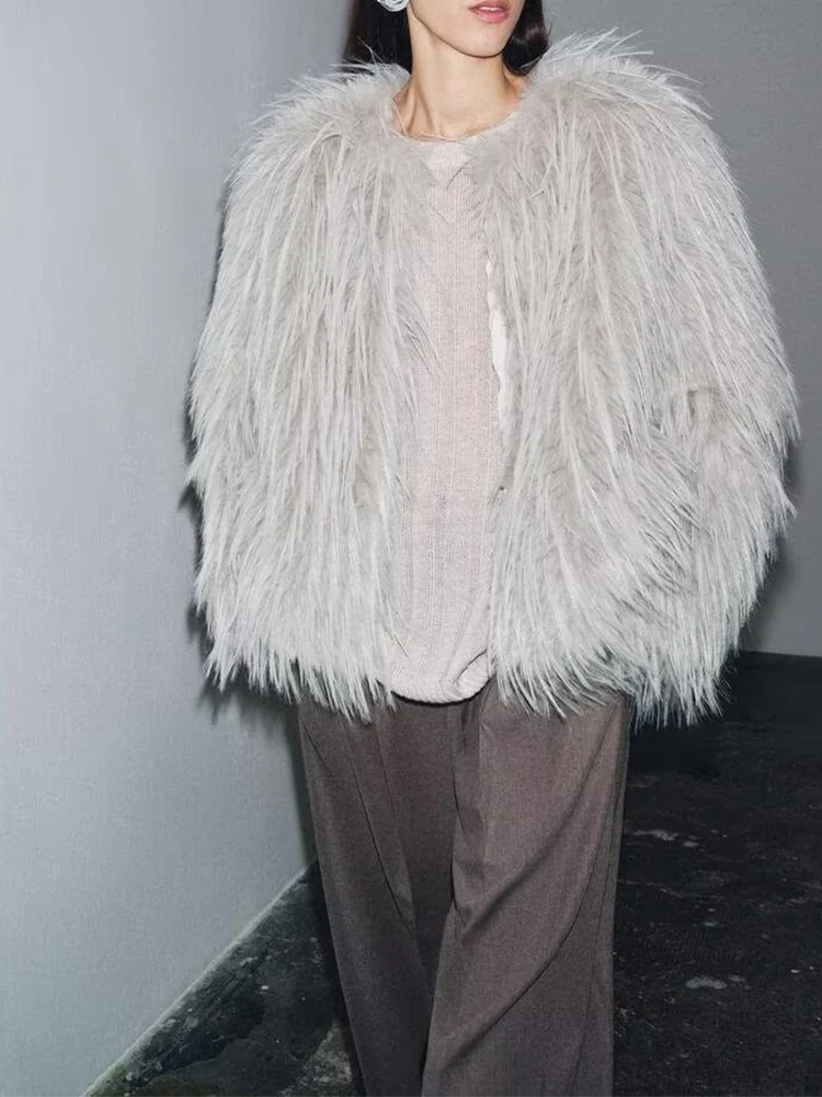 معطف/سترة نسائية جديدة على الطراز الأوروبي عصرية ومتعددة الاستخدامات بلون سادة ورقبة دائرية من الفرو الصناعي