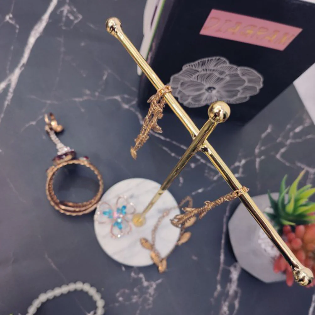 

Metal Jewelry Rack with Marble Base Cross Shaped Earrings Organizer Jewelry Holder for Bracelets Rings Display Store Home Use