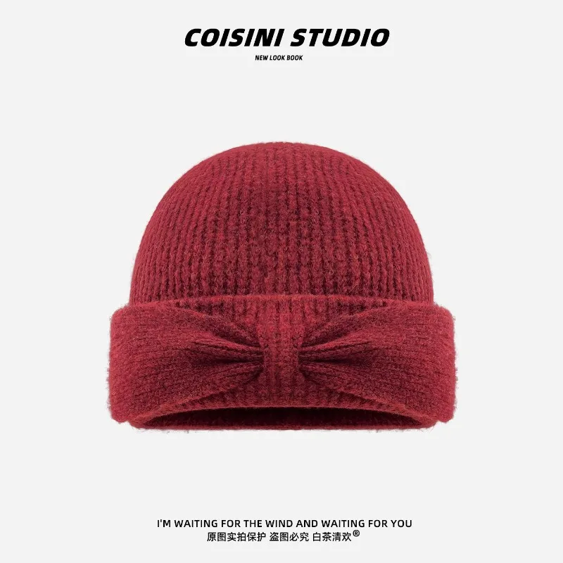Koreanischer Stil Herbst- und Winter-Strickmütze mit einfacher Schleife für Damen, warme Ohrenschutz-Beanie-Mütze für Herbst und Winter. – Detail 4