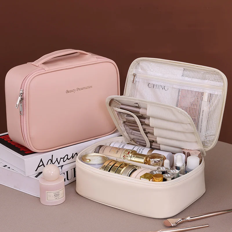 Neue Damen-Kosmetiktasche für Reisen, multifunktionale, geteilte Tasche mit großer Kapazität, tragbarer Kosmetik-Organizer mit großem Fassungsvermögen und edlem Aussehen.