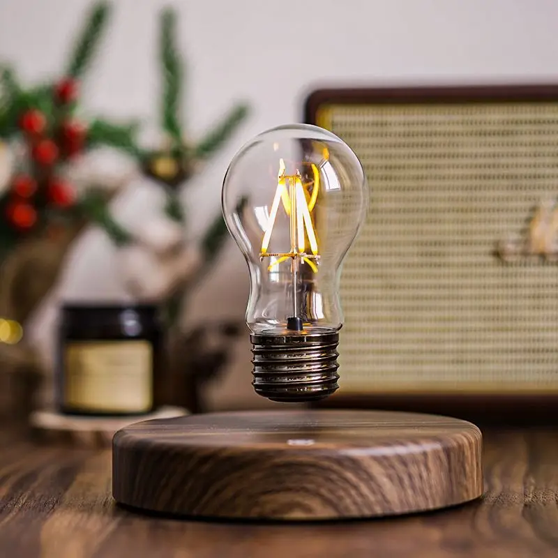 Lampadina galleggiante con forza attraente, decorazione desktop dall'atmosfera di fascia alta con tecnologia nera creativa