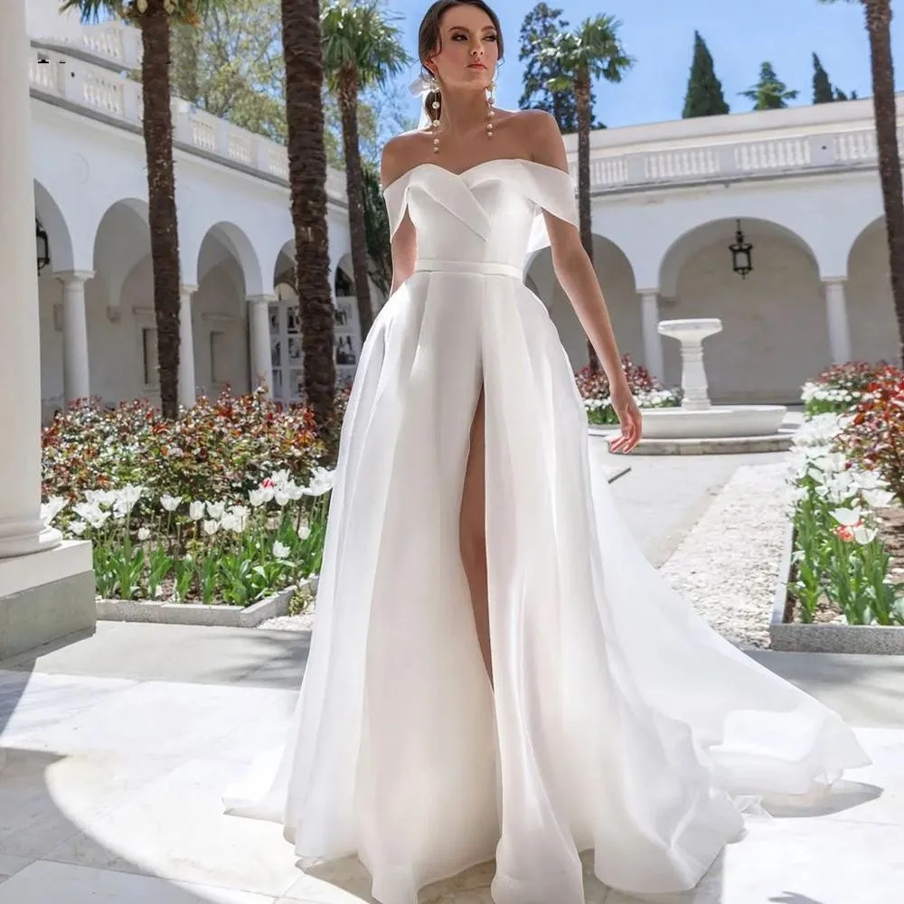 Elegant A-Line Skirt Off The Shoulder Wedding Dress 2023 Gorgeous Satin High Slit Pleats Bust Ivory White Sleeveless Bridal Gown