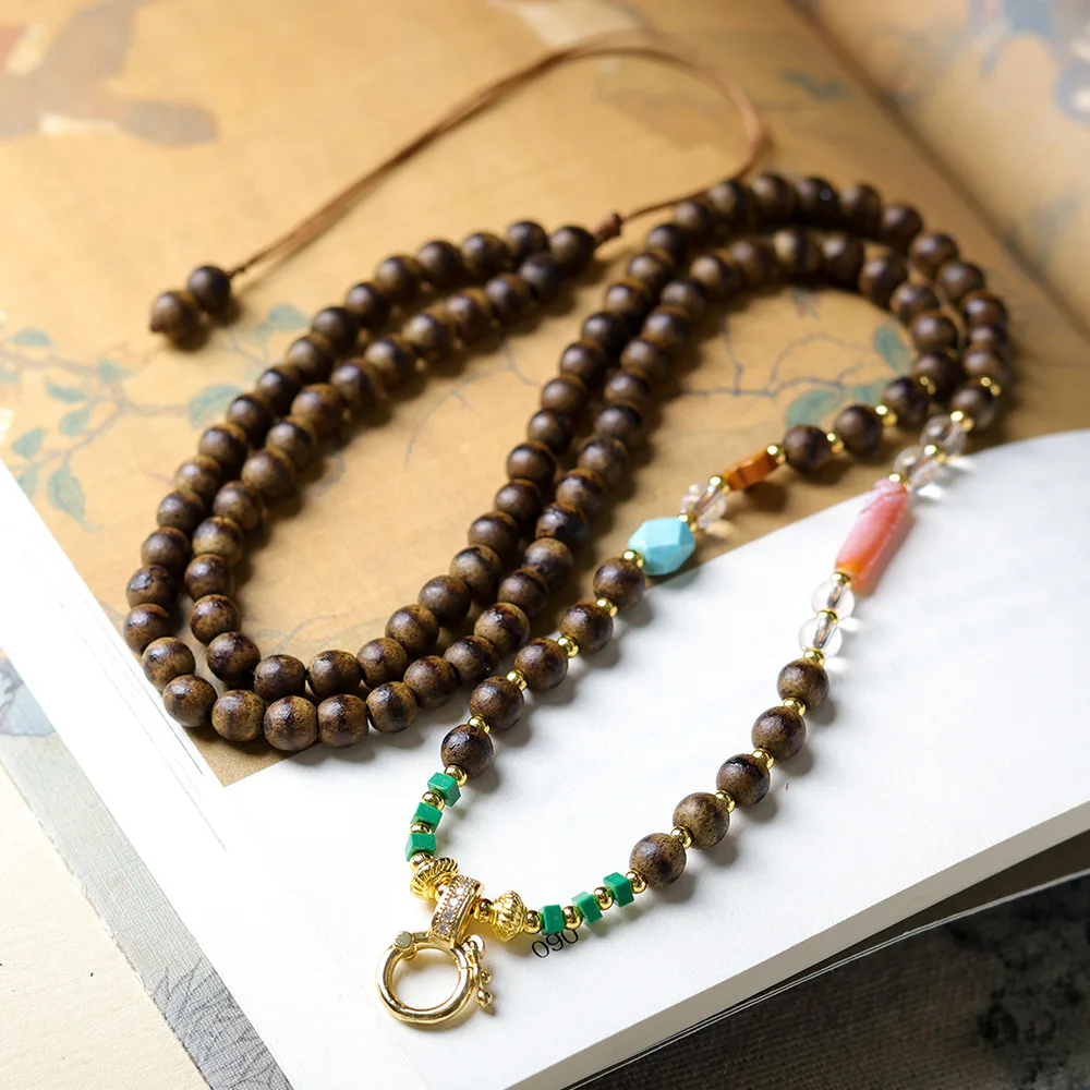 

Original design hand-woven first-line butter agalwood universal pendant rope new Chinese-style wooden bracelet