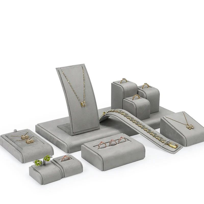 

Grey textured leather necklace, ring, earrings, jewelry display stand, counter, accessory display props