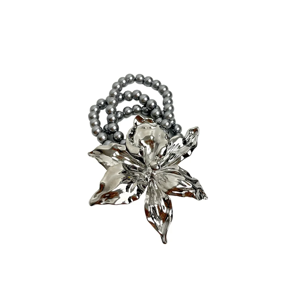

Cold wind metal iris bracelet female retro personality multi-layer elastic rope pearl bracelet