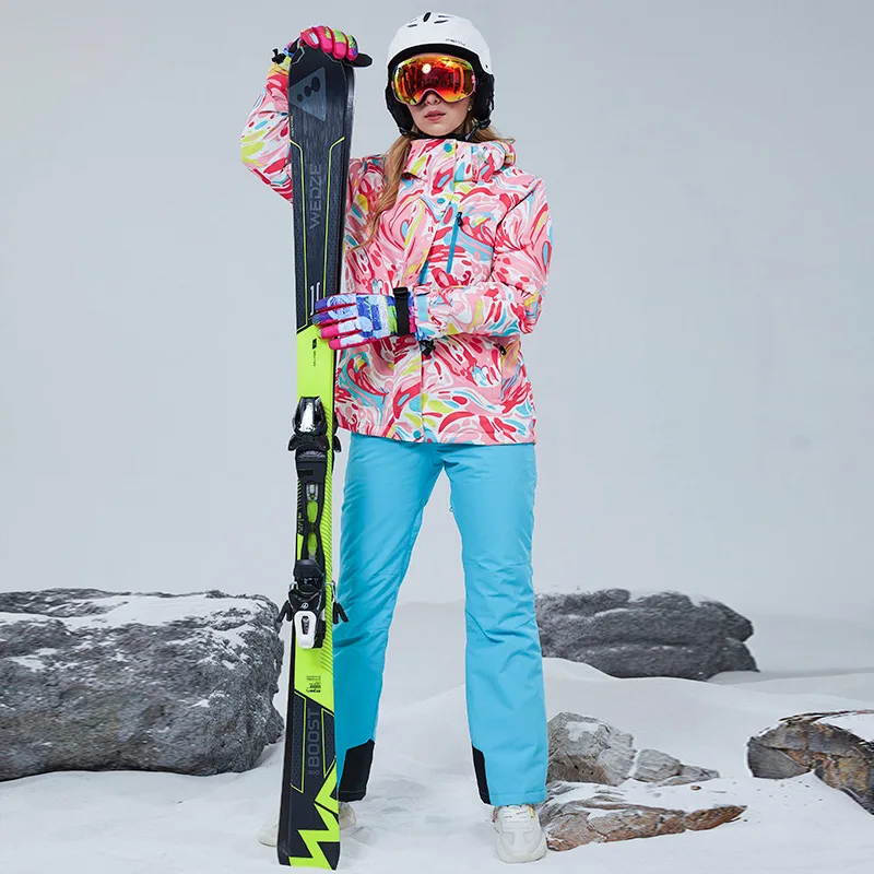 -30 ℃ tuta da sci da donna rosa tuta da neve impermeabile da donna calda giacca da snowboard e pantaloni con un cappello