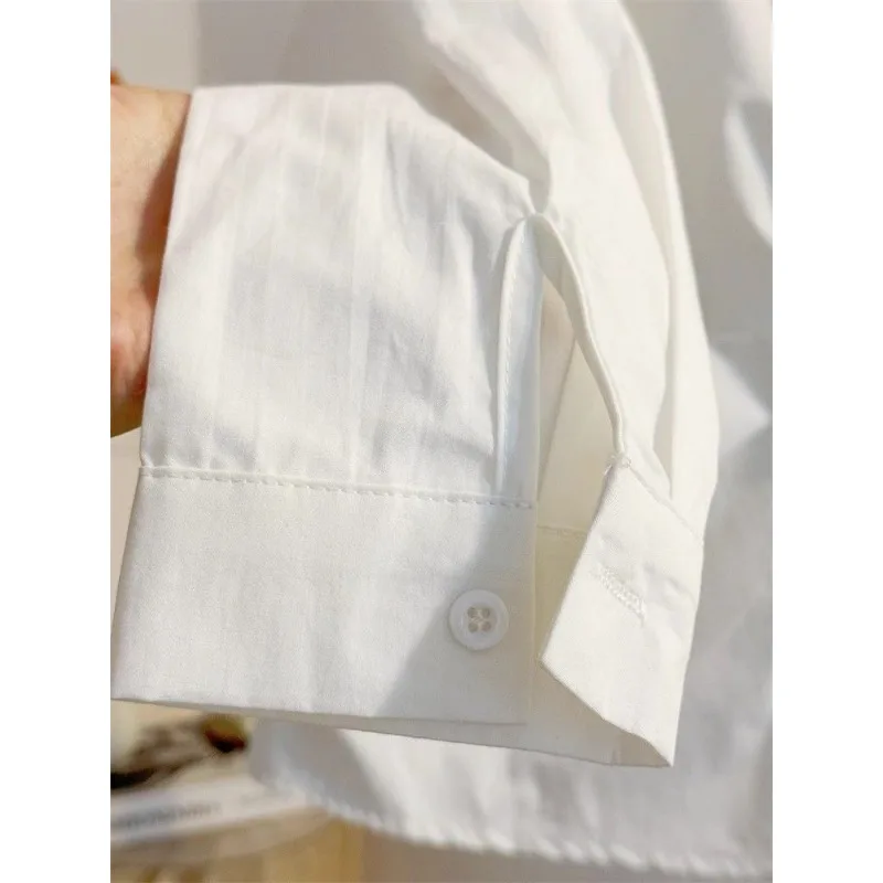 Niche Design Sense Camicia bianca a maniche lunghe che abbraccia la vita per camicia da pendolarismo francese primaverile da donna Top temperamento