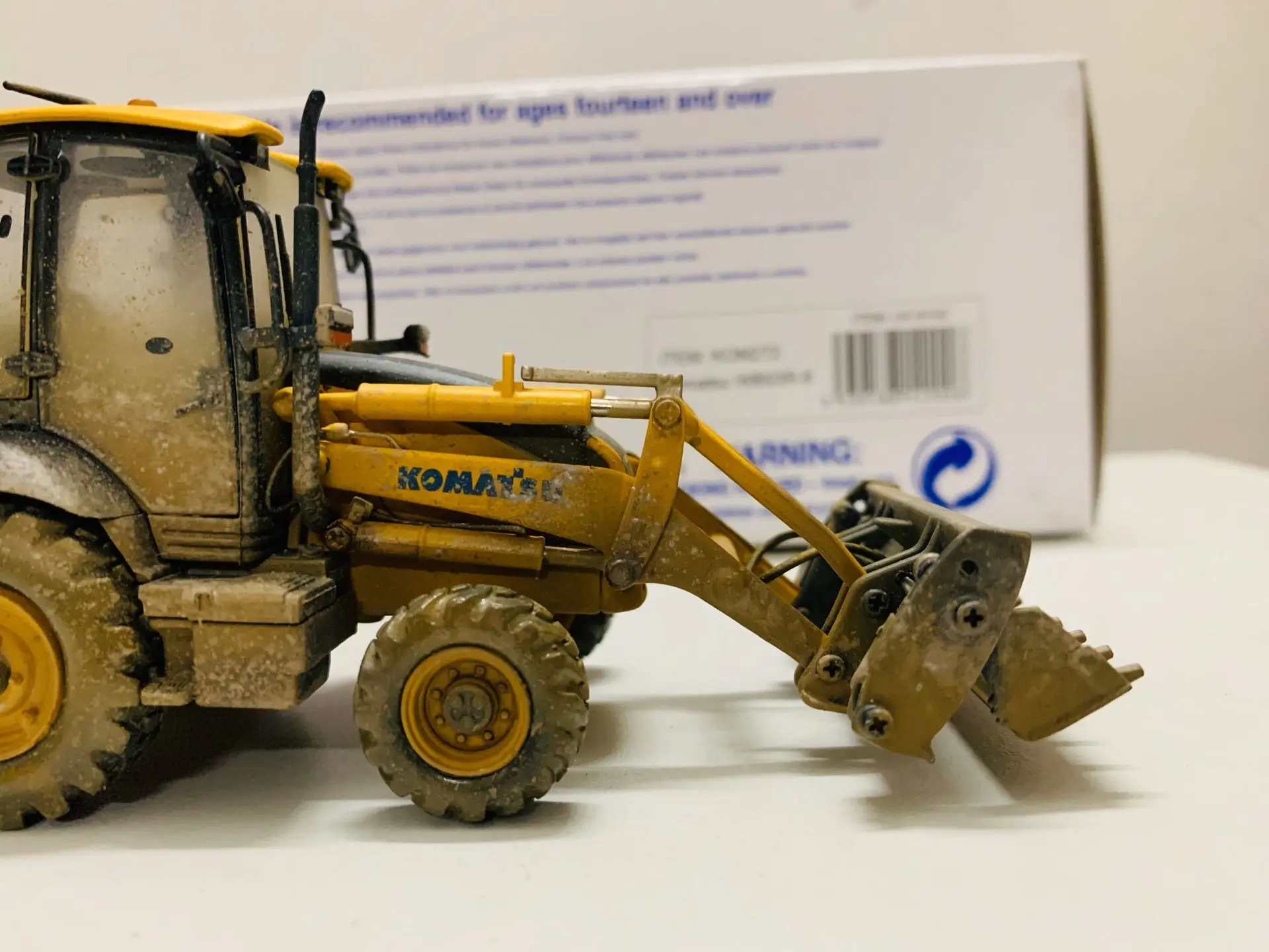 Komatsu WB93R-8 Backhoe Loader Muddy Version 1:50 Scale DieCast Model UH8142 New