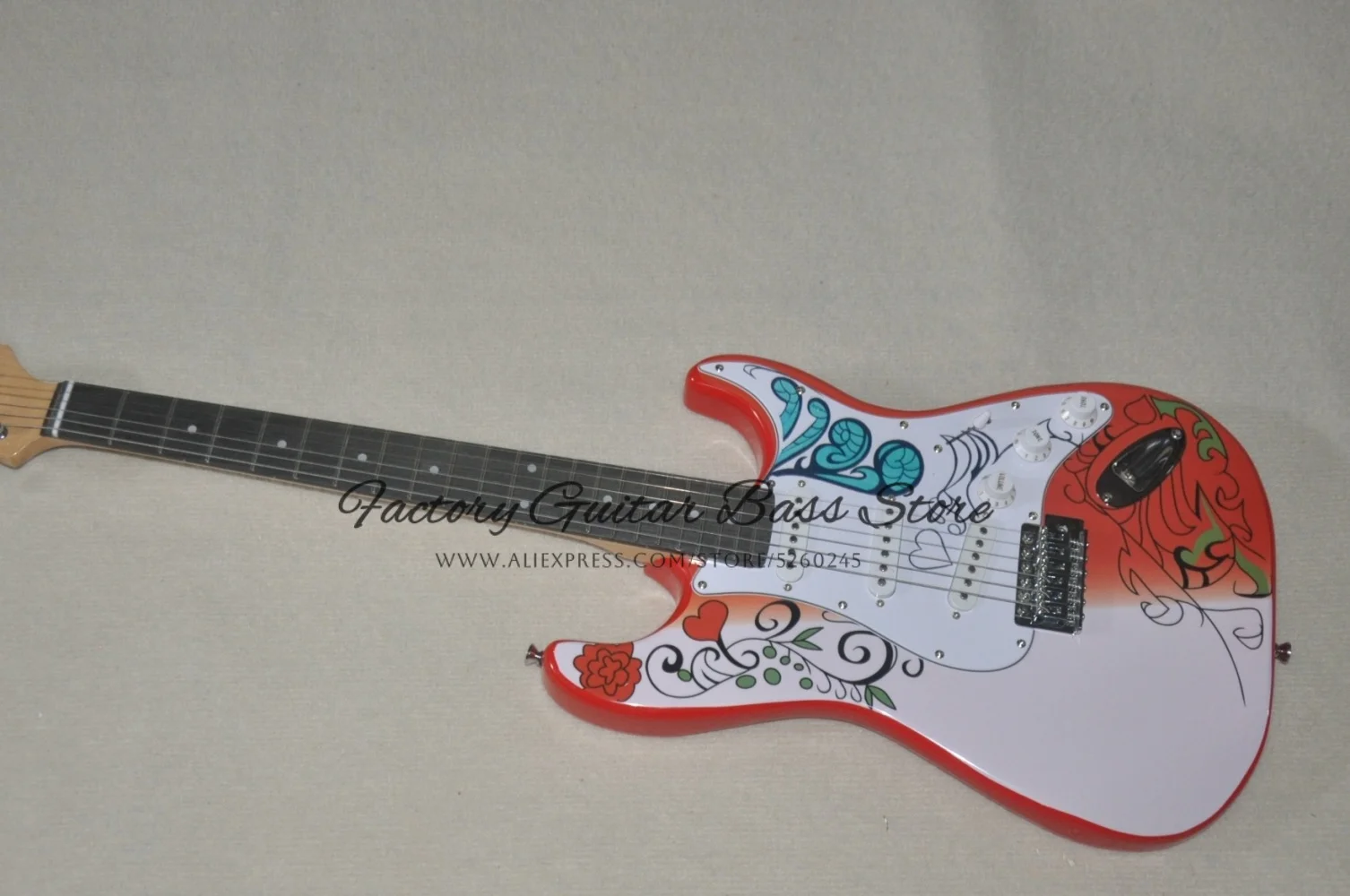 In stock, red guitar, white floral pattern, single pickguard, solid wood body, maple neck, vintage tuner