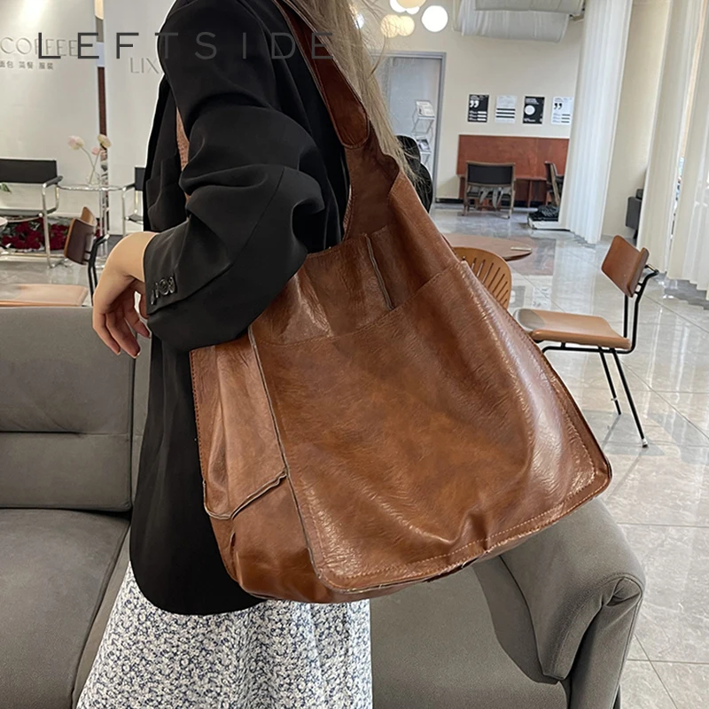 

Левая сторона, женская сумка через плечо из искусственной кожи большой вместимости, зима 2025, мягкая сумка-хобо в стиле ретро, роскошные дизайнерские новые трендовые женские сумки