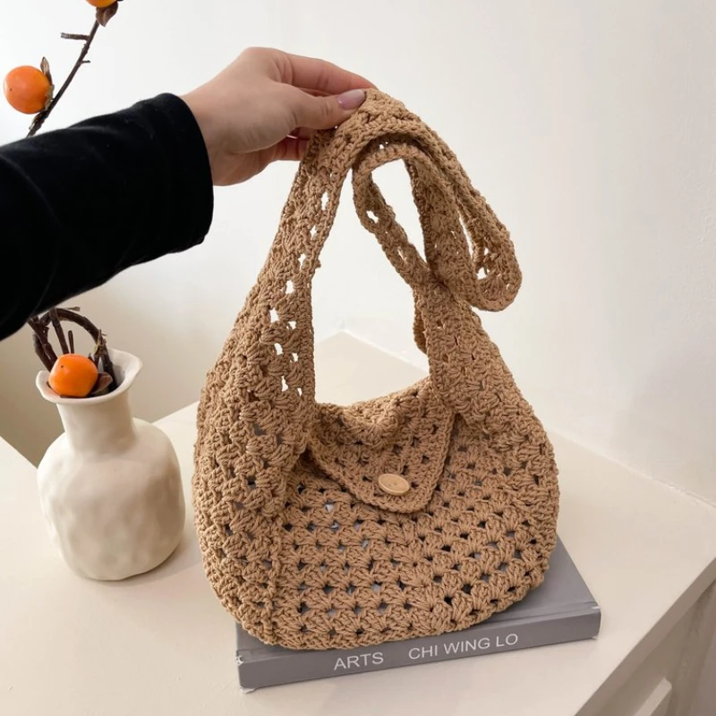

Trendy Hollow Woven Women's Shoulder Bag 2026 New Fashionable Women's Shoulder Bag Beach Vacation Tote Bag Bolsas De Mujer