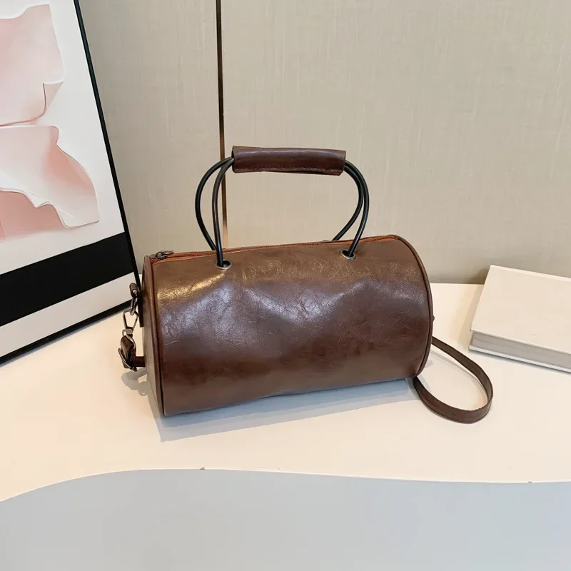 

2024 Summer New Hot Selling Hand Carrying Retro Cylinder Bag Women's Bag Fashion Single Shoulder Crossbody Bag