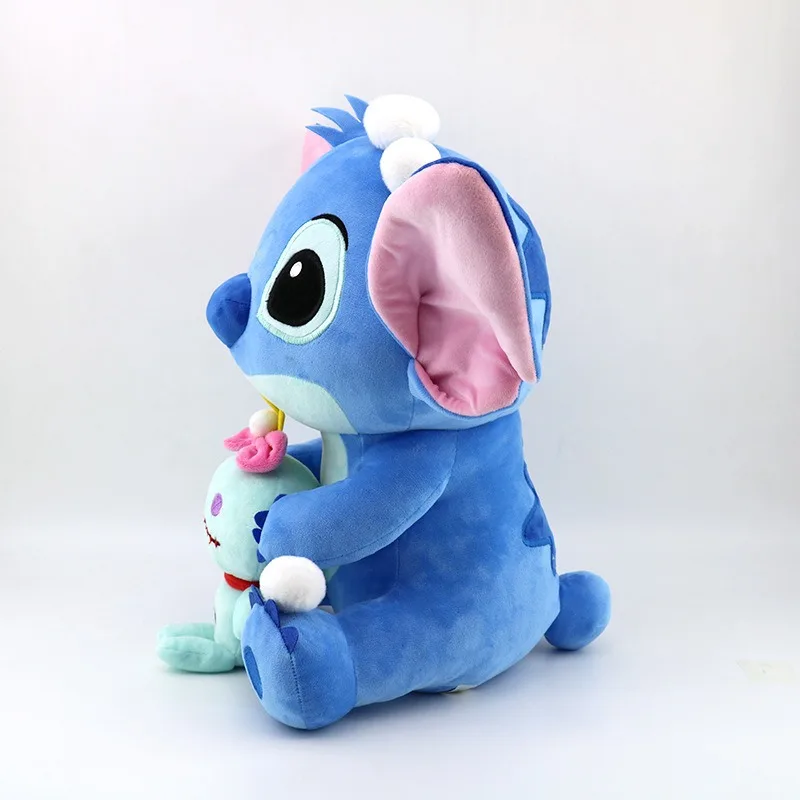 Disney peripheral summer interstellar baby Stitch plush toy Stitch holding small gold doll pillow creative holiday gift birthday