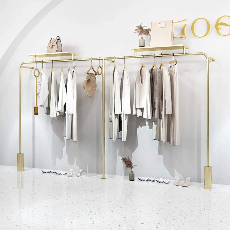 

Стеллаж для демонстрации одежды, настенный стеллаж из нержавеющей стали с титановым покрытием, специальный стеллаж для женской одежды в магазине.