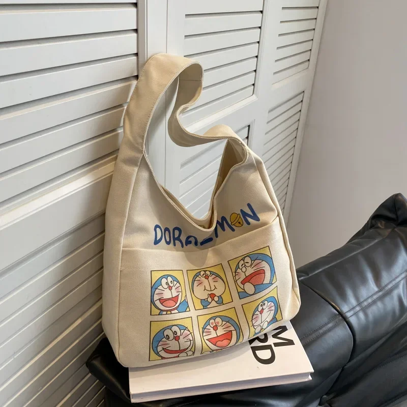 Sac fourre-tout en toile Doraemon pour femmes, sac de rangement de grande capacité, sac à main de classe étudiant, nouvelle mode, dessin animé