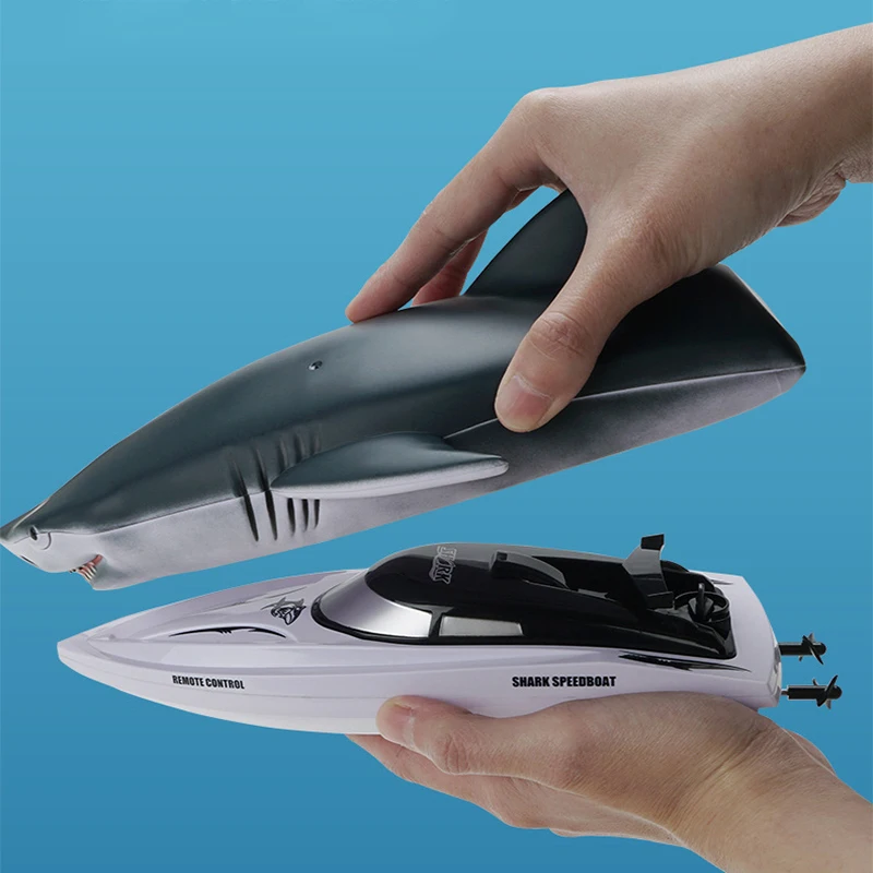 

Новый 2,4G RC акула высокоскоростная лодка Беспроводное управление 2-в-1 Водонепроницаемая гоночная модель моделирования воды электронная Лодка Игрушки для мальчиков