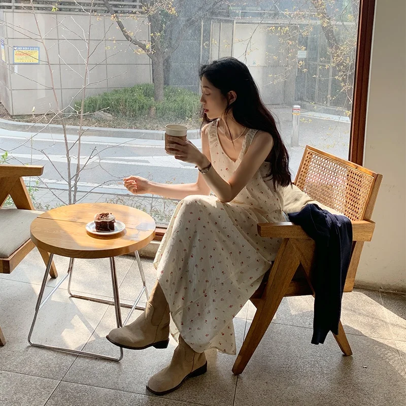 Słodka, elegancka letnia sukienka bez rękawów z kwiatowym nadrukiem, luźna, codzienna, damska, długa, rozkloszowana.