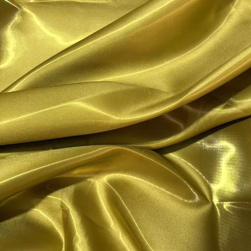 Luxury Glossy Liquid Satin Fabric Reflective Galaxy Shiny Bridal Satin Fabric for Fashion Dress Suit Design Material