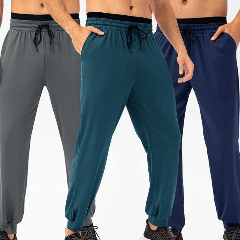 Calça de corrida masculina, calça esportiva de fibra, perna elástica, treino casual ao ar livre