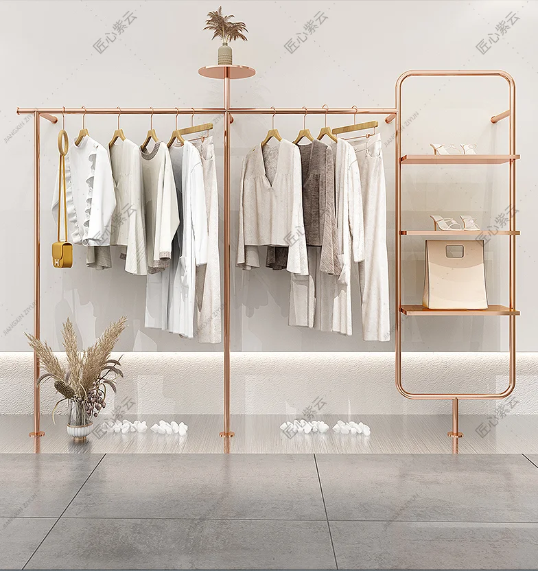 Wall mounted stainless steel rose gold women's wear special display shelf on the display shelf of high-end clothing store