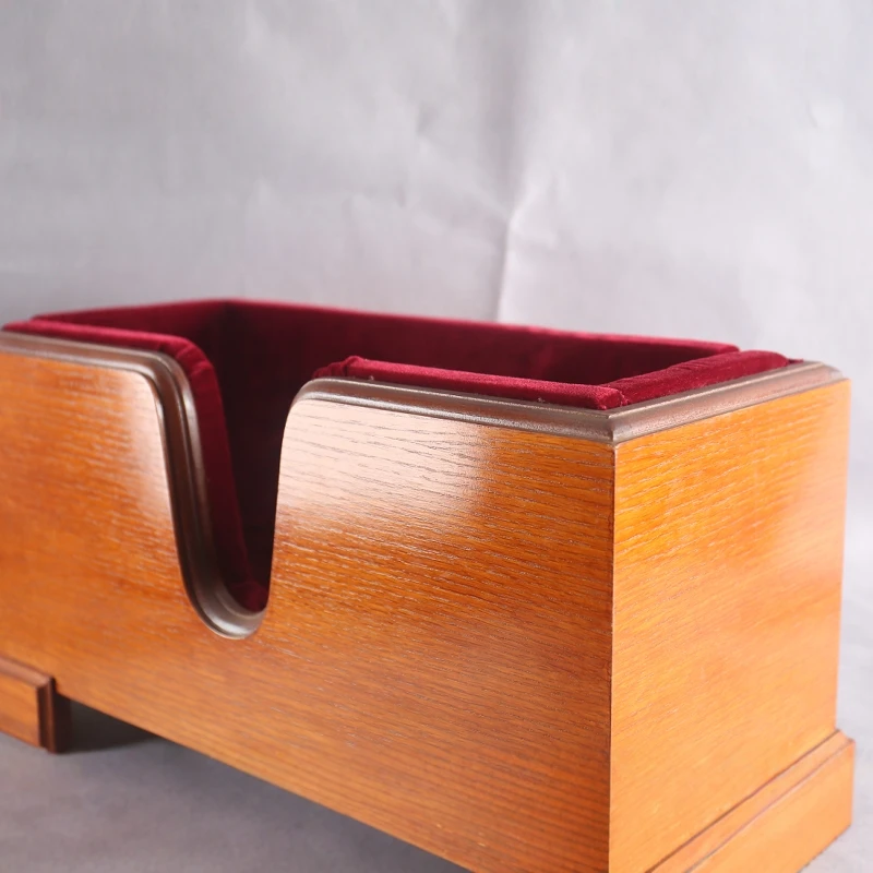 A solid wood bracket suitable for upright cello, protecting the instrument from collisions (leaving room for the bow)