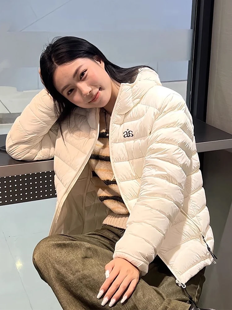 عارضة Sle مقنعين القطن Jaet المرأة الدفء متر البيج ort معطف الخريف الشتاء الاتجاه الكوري بسيط مطابقة ملابس خارجية