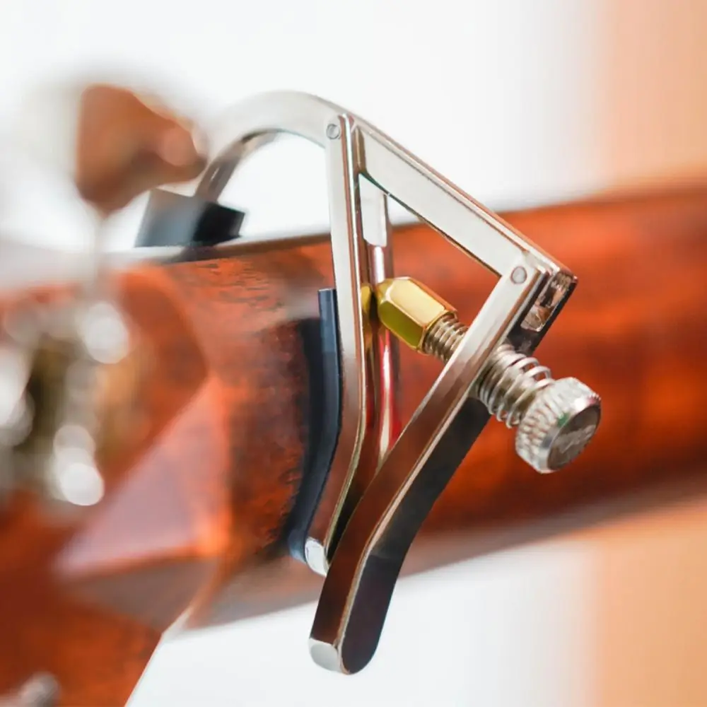 

Pin Puller Design Guitar Capo with Pick Holder with Silicone Pad Guitar Tuning Clip Universal Portable Guitar Quick Change Clamp