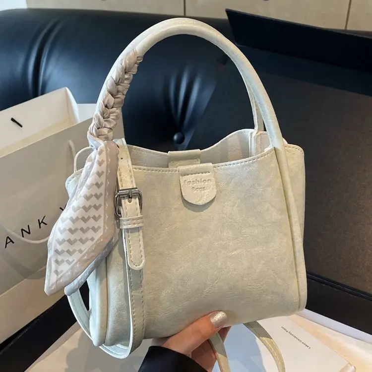 Niche simple bucket bag women's 2025 new versatile silk scarf handbag work hand carry shoulder messenger bag