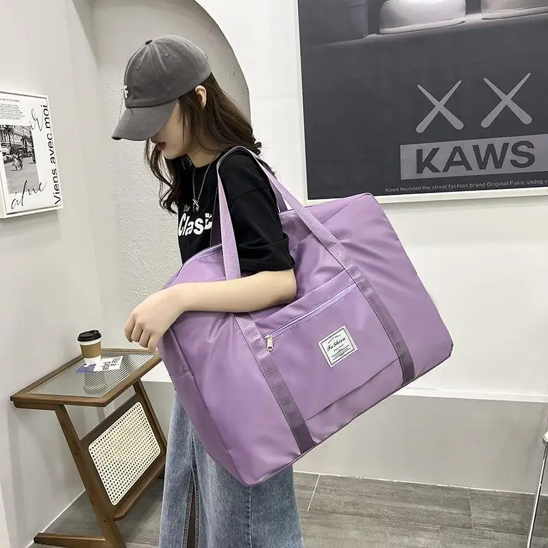 

New Large Capaci Travel Storage Bag ort Trip Lage Portable Women's Foldable Travel Storage Bag Ox Cloth Material
