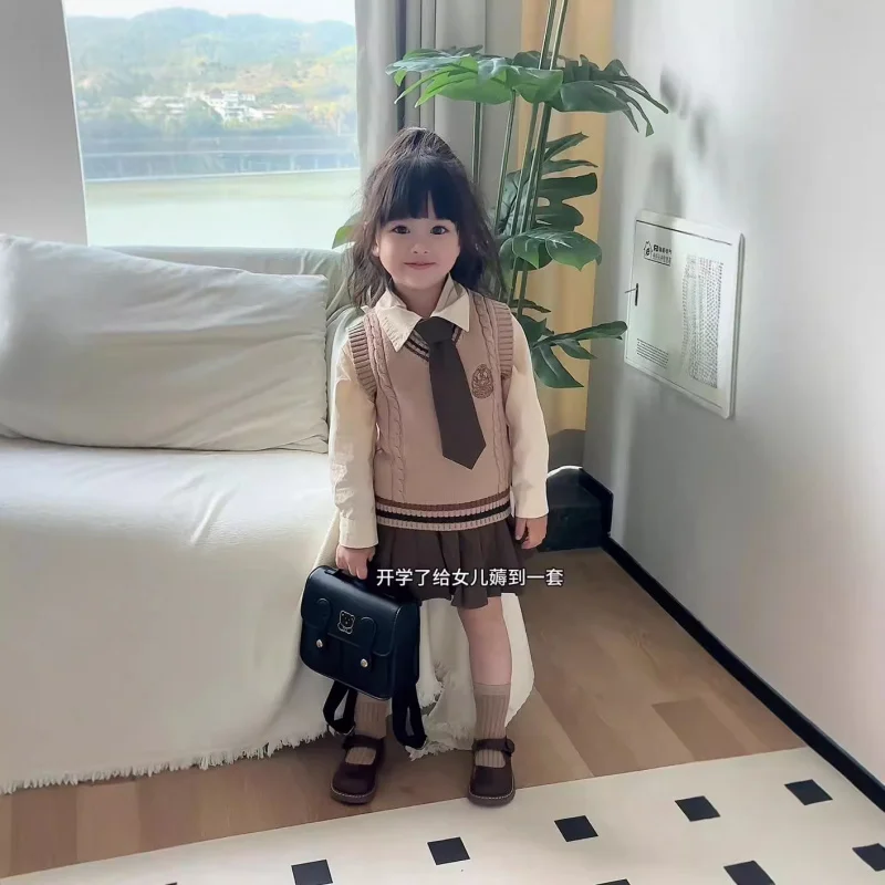 

Spring and autumn college stylejkUniform Suit Girls' Knitted Vest Jacket Shirt Pleated Skirt Three-Piece Set65087