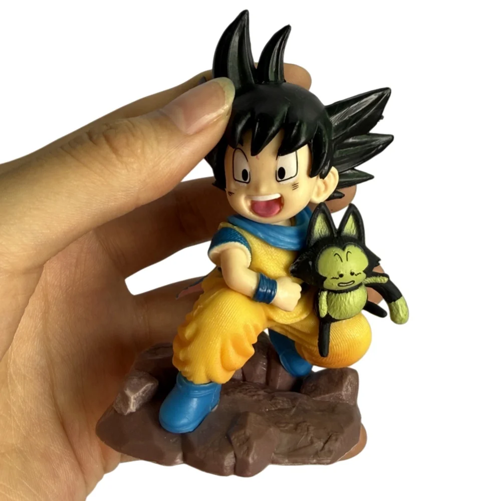10CM Kindheits-Goku Umarmt Puer Ya Mu Tee Kleiner Gefährte Figuren Puppe PVC-Modell Statue Sammlerstück Spielzeug Geschenk